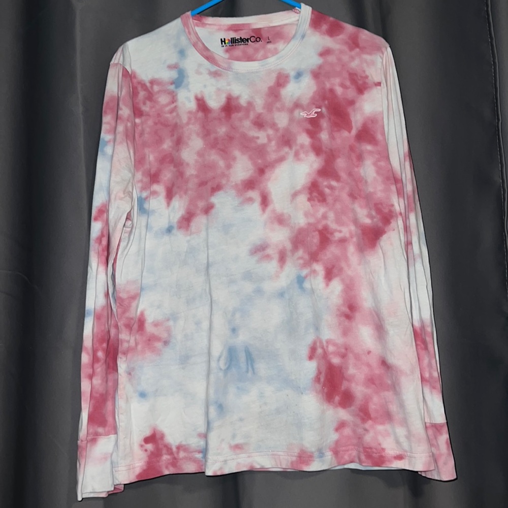 Men’s size large pink, light blue, and white long sleeve Hollister shirt